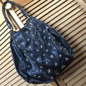 Black star-studded hobo bag!